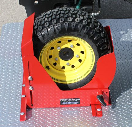 A black wheel with yellow mags in a red wheel locker