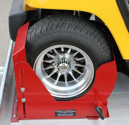 A wheel with silver mags in a red wheel locker