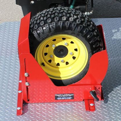 A black wheel with yellow mags in a red wheel locker